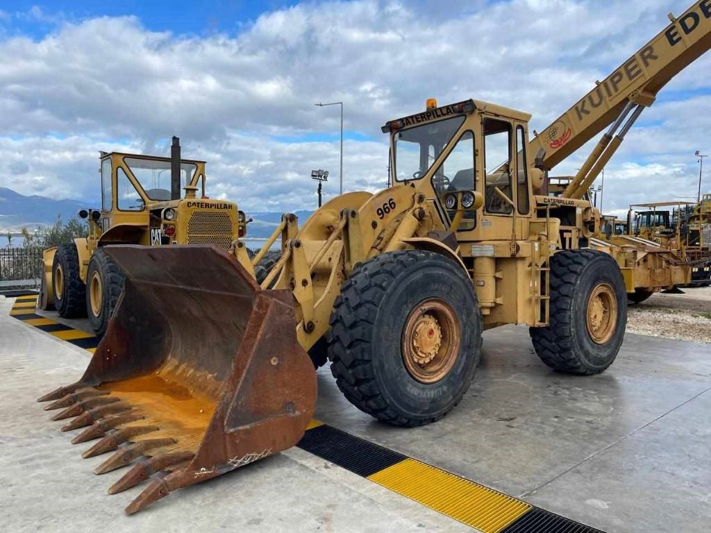CAT 966 C - Gumikerekes homlokrakodó: 4 kép. CAT 966 C - Gumikerekes homlokrakodó: 4 kép.