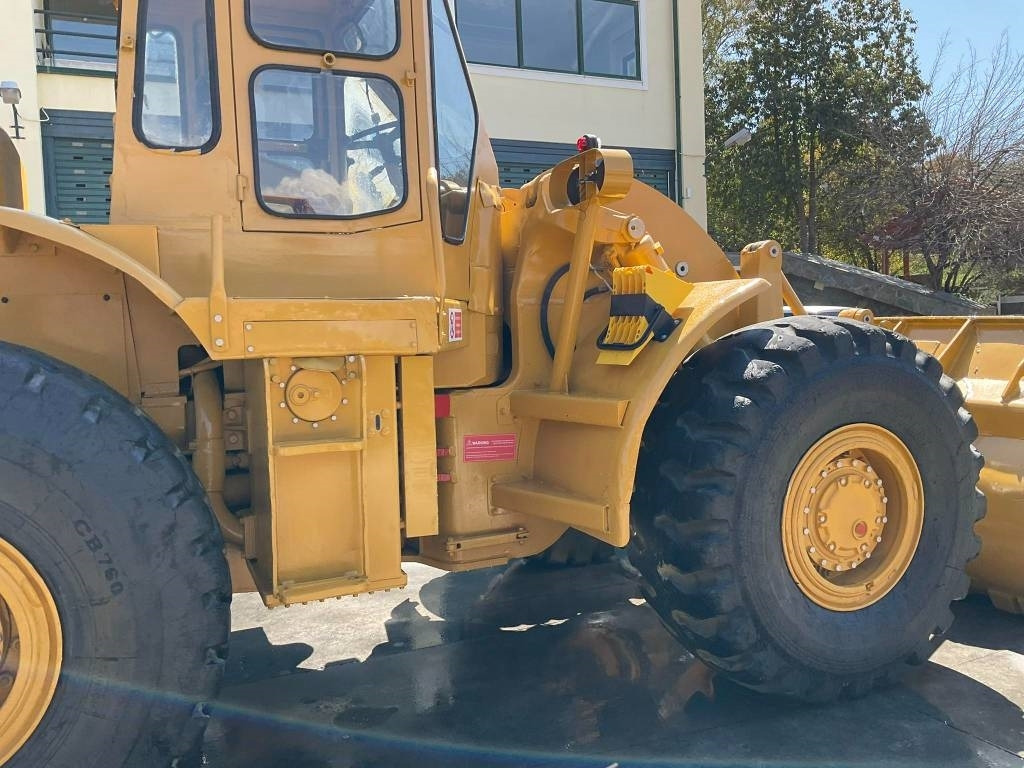 CAT 966C - Gumikerekes homlokrakodó: 2 kép. CAT 966C - Gumikerekes homlokrakodó: 2 kép.