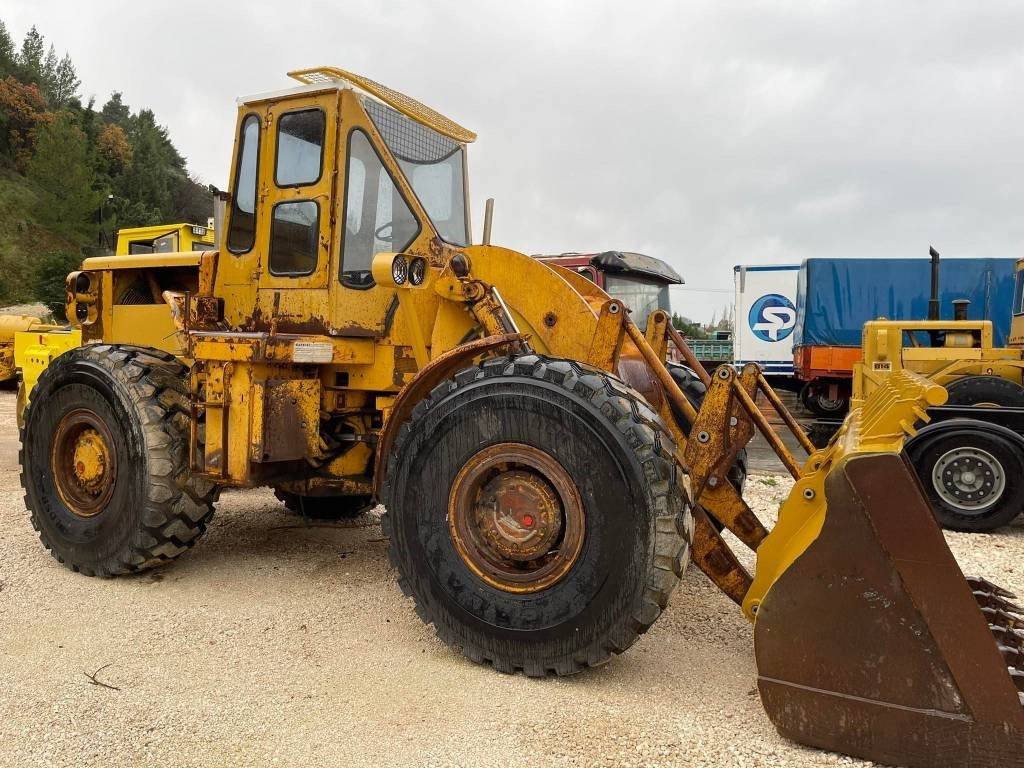 CAT 966C - Gumikerekes homlokrakodó: 3 kép. CAT 966C - Gumikerekes homlokrakodó: 3 kép.