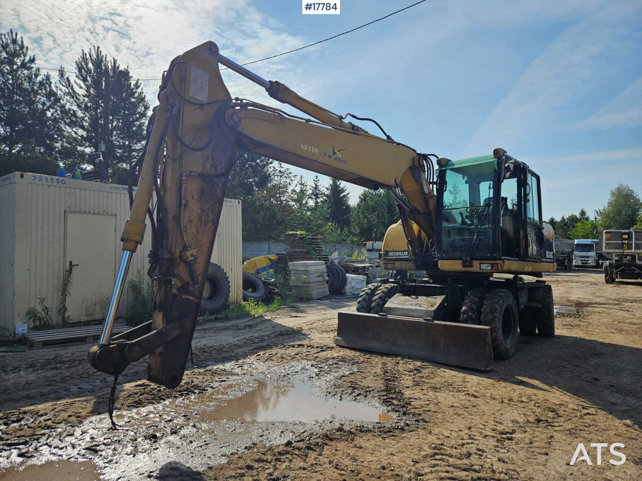 2004 CAT M316C - Gumikerekes kotró: 1 kép. 2004 CAT M316C - Gumikerekes kotró: 1 kép.