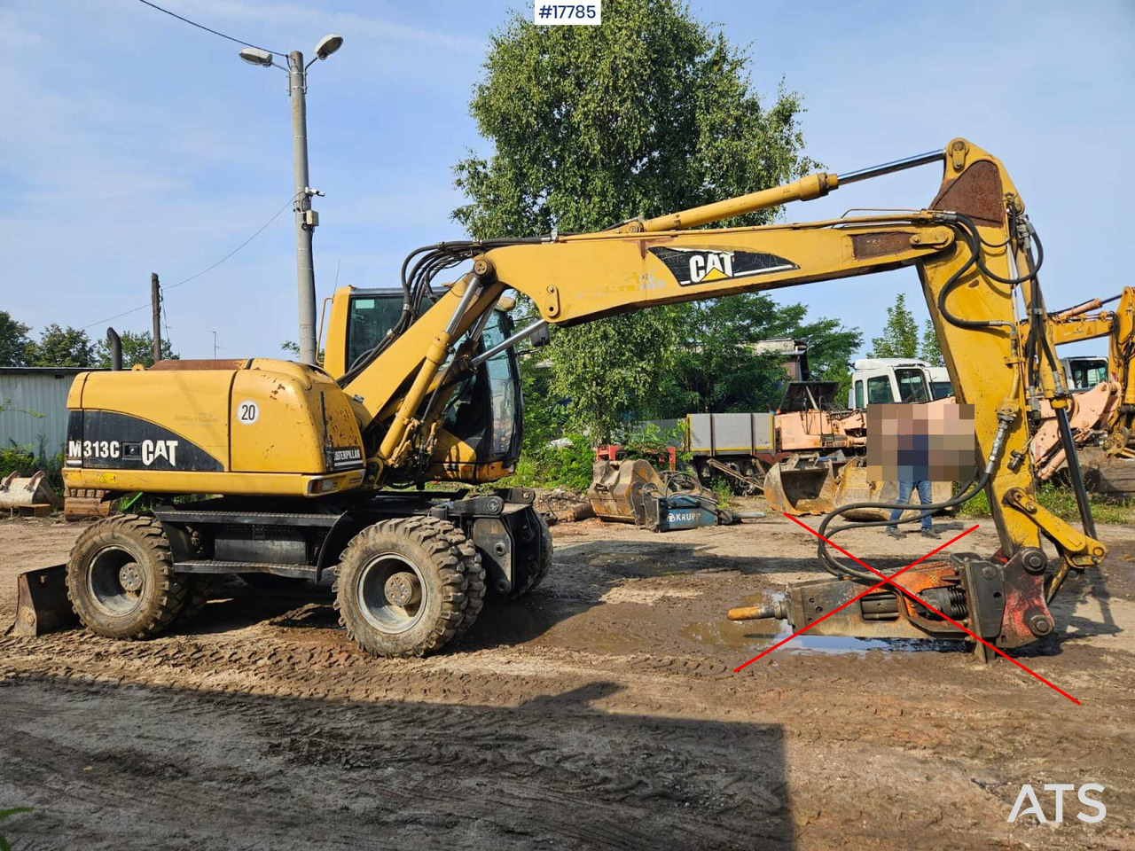 2005 CAT M313 C - Gumikerekes kotró: 5 kép. 2005 CAT M313 C - Gumikerekes kotró: 5 kép.