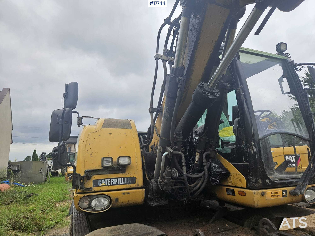 Gumikerekes kotró 2008 CAT M316D: 10 kép.
