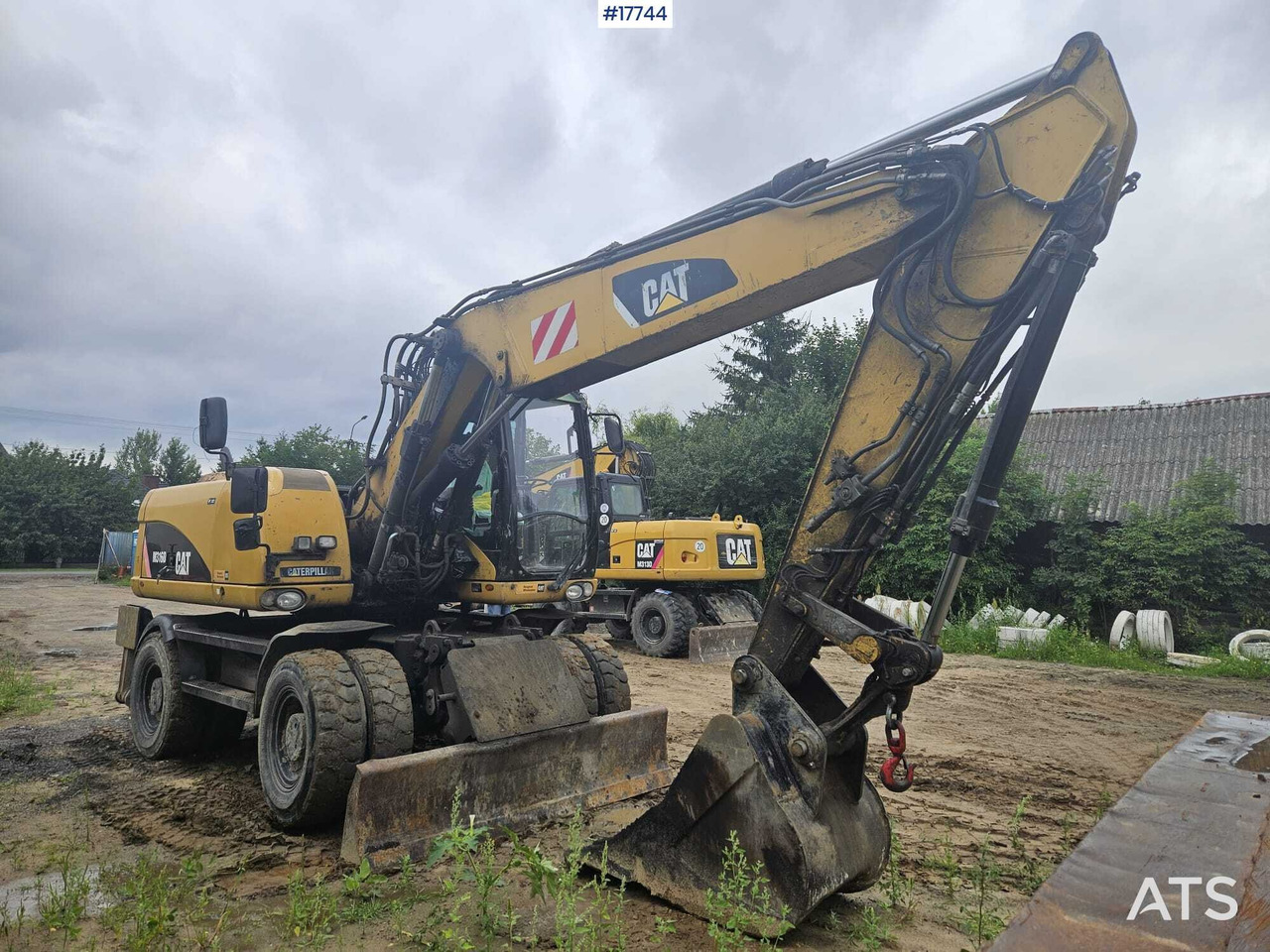 2008 CAT M316D - Gumikerekes kotró: 2 kép. 2008 CAT M316D - Gumikerekes kotró: 2 kép.