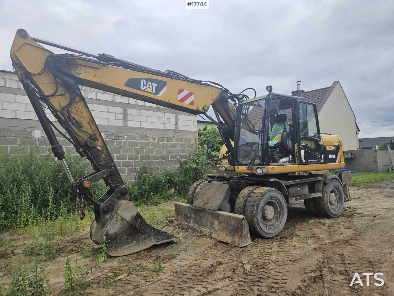 2008 CAT M316D - Gumikerekes kotró: 1 kép. 2008 CAT M316D - Gumikerekes kotró: 1 kép.