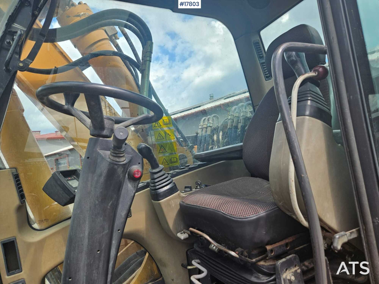 Gumikerekes kotró 2008 Case  WX 165: 8 kép.