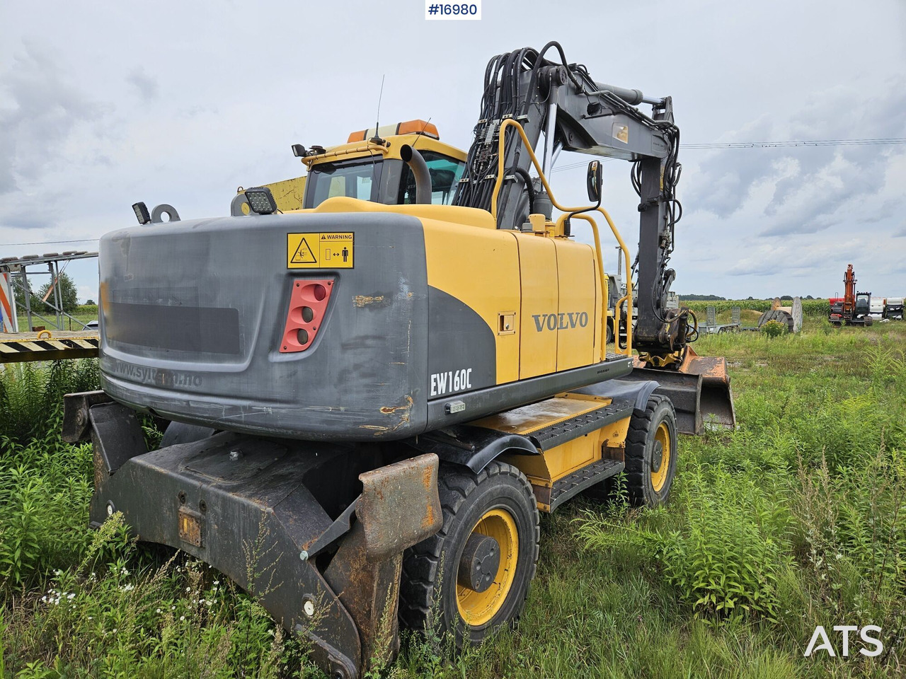 2010 Volvo EW160C z rototilt i łyżką w zestawie - Gumikerekes kotró: 5 kép. 2010 Volvo EW160C z rototilt i łyżką w zestawie - Gumikerekes kotró: 5 kép.