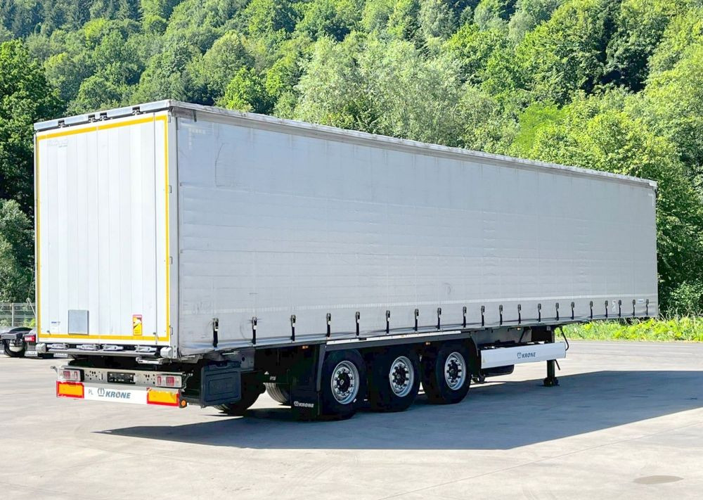 Krone Firanka Coilmulde // 9m // Alu Drzwi // Ażury // Oś podnoszona // - Ponyvás félpótkocsi: 1 kép. Krone Firanka Coilmulde // 9m // Alu Drzwi // Ażury // Oś podnoszona // - Ponyvás félpótkocsi: 1 kép.