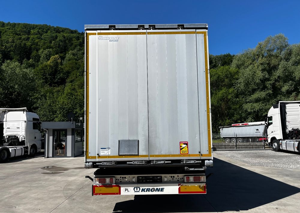 Krone Firanka Coilmulde // 9m // Alu Drzwi // Ażury // Oś podnoszona // - Ponyvás félpótkocsi: 2 kép. Krone Firanka Coilmulde // 9m // Alu Drzwi // Ażury // Oś podnoszona // - Ponyvás félpótkocsi: 2 kép.