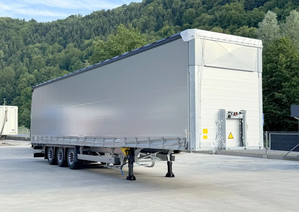 Schmitz Cargobull MEGA VARIOS + BDE - Ponyvás félpótkocsi: 4 kép. Schmitz Cargobull MEGA VARIOS + BDE - Ponyvás félpótkocsi: 4 kép.