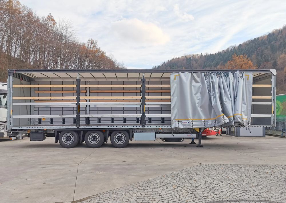 Schmitz Cargobull MEGA VARIOS + BDE - Ponyvás félpótkocsi: 5 kép. Schmitz Cargobull MEGA VARIOS + BDE - Ponyvás félpótkocsi: 5 kép.