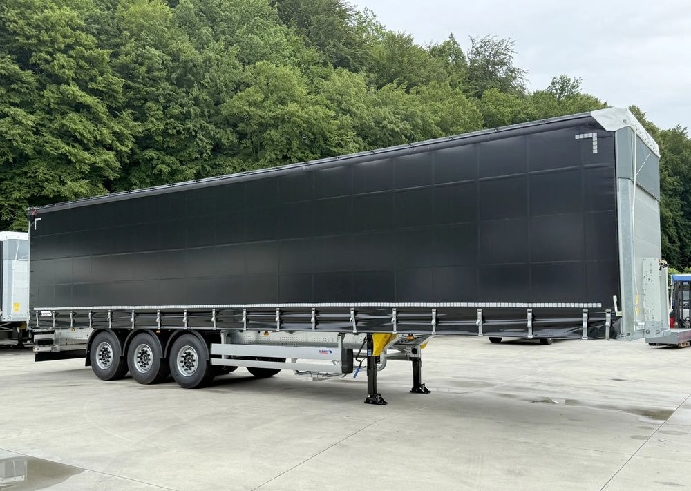 Schmitz Cargobull STANDARD + DACH VARIOS SIMPLE - Ponyvás félpótkocsi: 3 kép. Schmitz Cargobull STANDARD + DACH VARIOS SIMPLE - Ponyvás félpótkocsi: 3 kép.