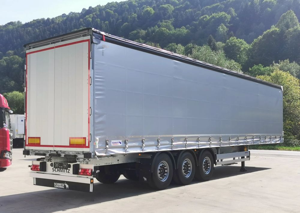 Schmitz Cargobull STANDARD + DACH VARIOS SIMPLE - Ponyvás félpótkocsi: 3 kép. Schmitz Cargobull STANDARD + DACH VARIOS SIMPLE - Ponyvás félpótkocsi: 3 kép.