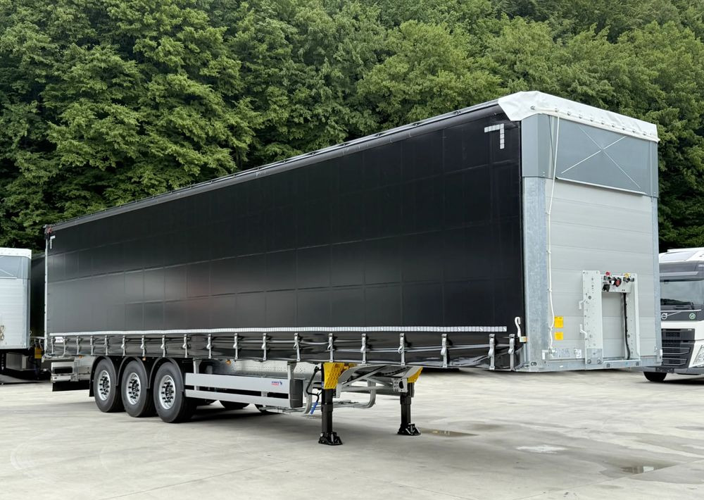 Schmitz Cargobull STANDARD + DACH VARIOS SIMPLE - Ponyvás félpótkocsi: 4 kép. Schmitz Cargobull STANDARD + DACH VARIOS SIMPLE - Ponyvás félpótkocsi: 4 kép.