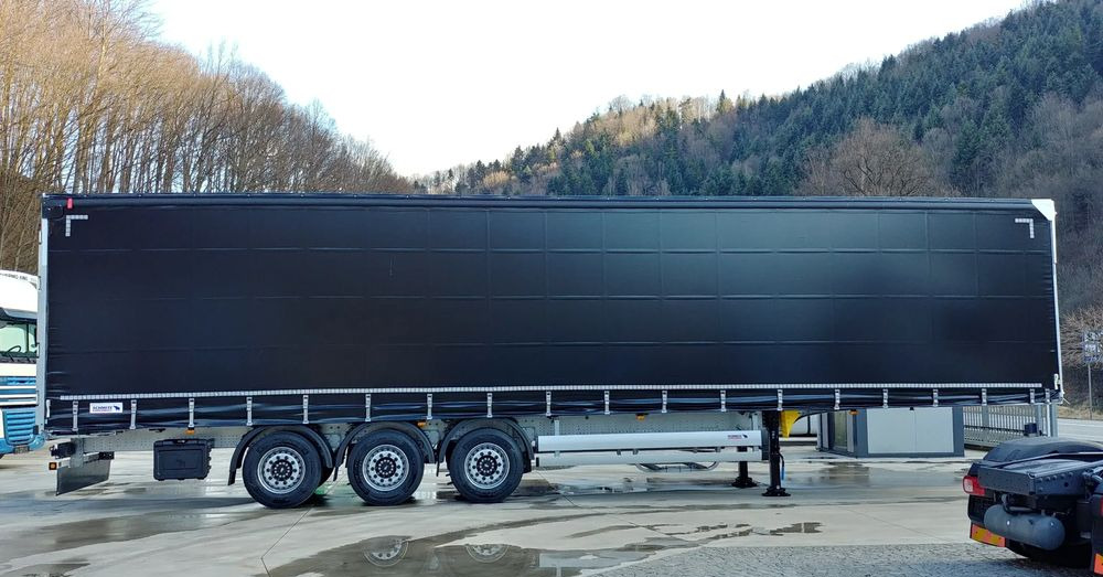 Schmitz Cargobull VARIOS - Ponyvás félpótkocsi: 2 kép. Schmitz Cargobull VARIOS - Ponyvás félpótkocsi: 2 kép.