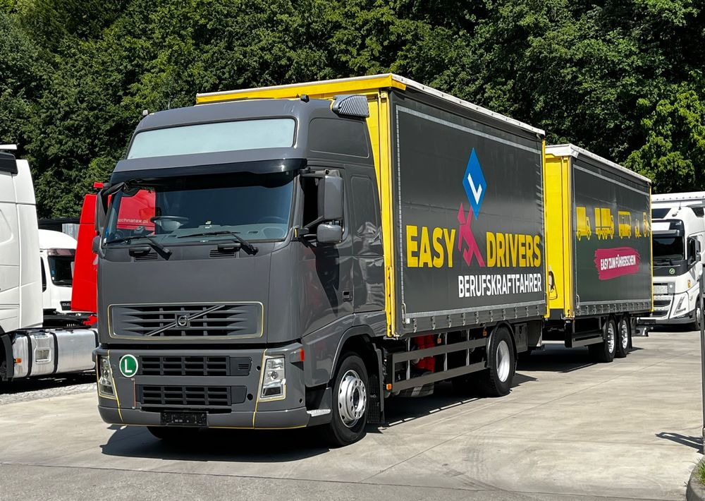 Volvo FH 420 4x2 // Zestaw + przyczepa Schwarzmuller // Jak Nowy // Niski przebieg // Automat // Idealny !!! - Ponyvás teherautó: 3 kép. Volvo FH 420 4x2 // Zestaw + przyczepa Schwarzmuller // Jak Nowy // Niski przebieg // Automat // Idealny !!! - Ponyvás teherautó: 3 kép.