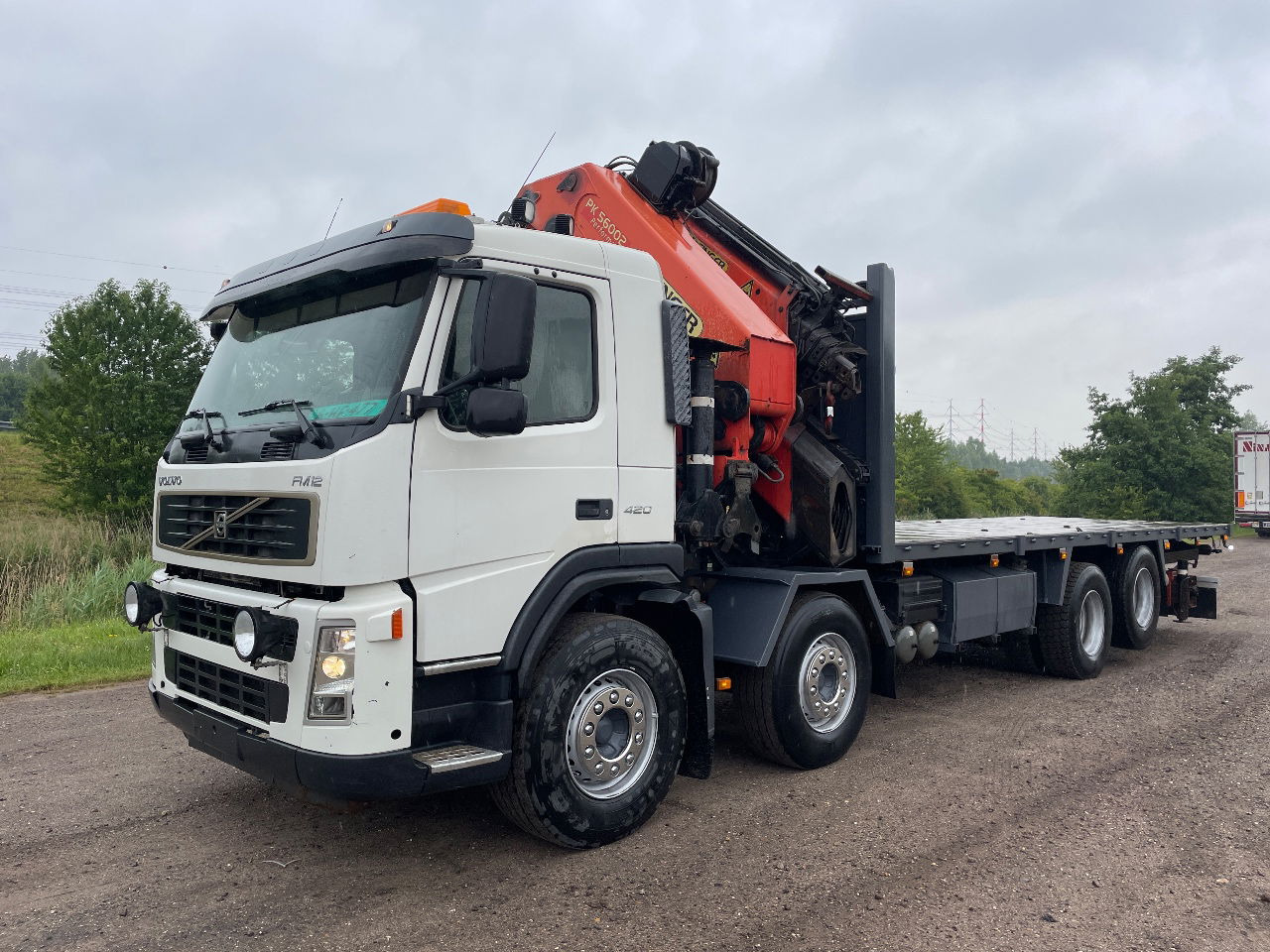 Volvo FM 12.420 with palfinger PK56002 with jib and winch, excellent condition - Darus autó: 3 kép. Volvo FM 12.420 with palfinger PK56002 with jib and winch, excellent condition - Darus autó: 3 kép.