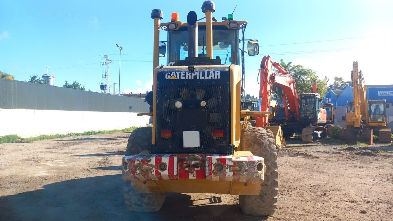 Caterpillar 930H - Gumikerekes homlokrakodó: 2 kép. Caterpillar 930H - Gumikerekes homlokrakodó: 2 kép.