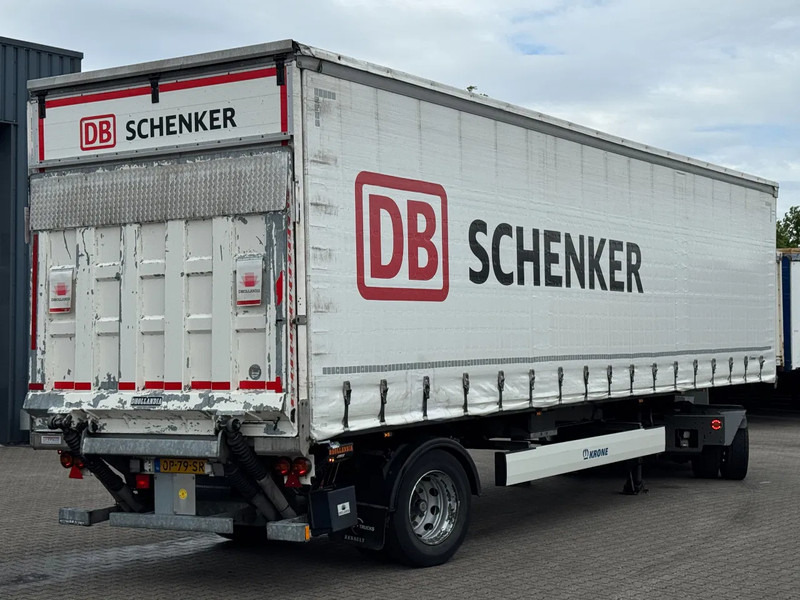 Krone City trailer met schuifzeilen / 2500 Laadklep / Stuur-as / APK - Ponyvás félpótkocsi: 1 kép. Krone City trailer met schuifzeilen / 2500 Laadklep / Stuur-as / APK - Ponyvás félpótkocsi: 1 kép.