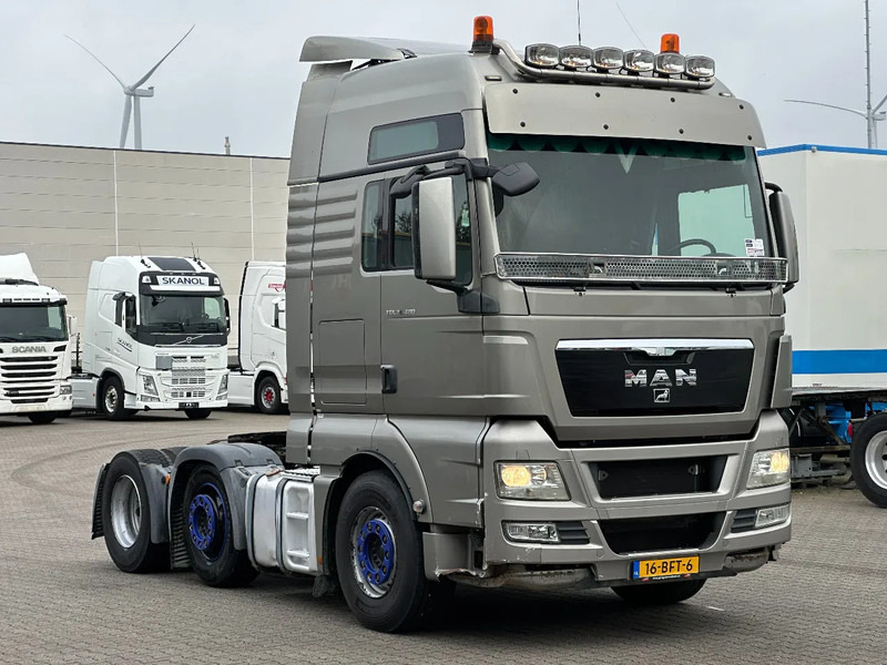 MAN TGX 26.480 XXL 6x2 Euro 5 / Hydraulics - Nyergesvontató: 2 kép. MAN TGX 26.480 XXL 6x2 Euro 5 / Hydraulics - Nyergesvontató: 2 kép.