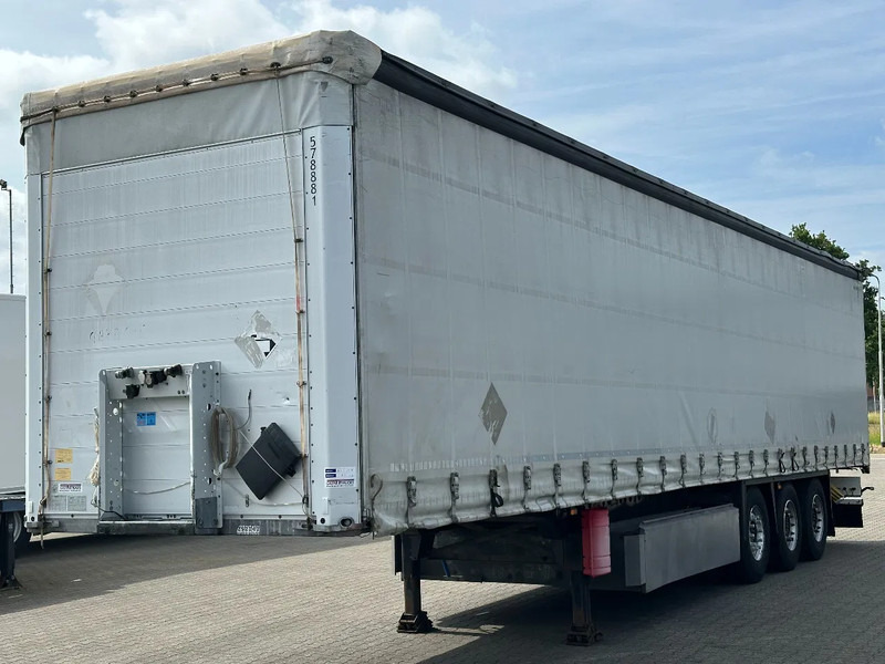 Schmitz Cargobull Schuifzeil met Coil / Schuifdak / Rotos-Disc - Ponyvás félpótkocsi: 3 kép. Schmitz Cargobull Schuifzeil met Coil / Schuifdak / Rotos-Disc - Ponyvás félpótkocsi: 3 kép.
