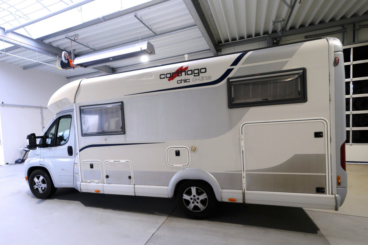 Carthago Chic C-Line T4.3/Einzelbetten/Garage/Klima/Solar - Félintegrált lakóautó: 4 kép. Carthago Chic C-Line T4.3/Einzelbetten/Garage/Klima/Solar - Félintegrált lakóautó: 4 kép.