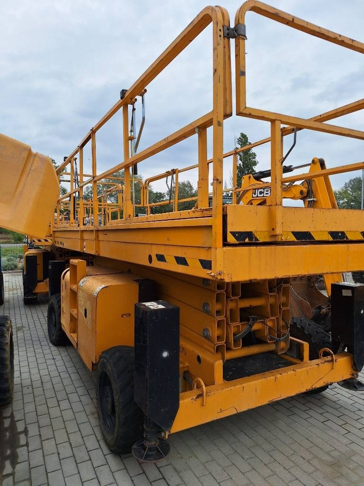 Haulotte H 15 SXL - Ollós emelő: 1 kép. Haulotte H 15 SXL - Ollós emelő: 1 kép.