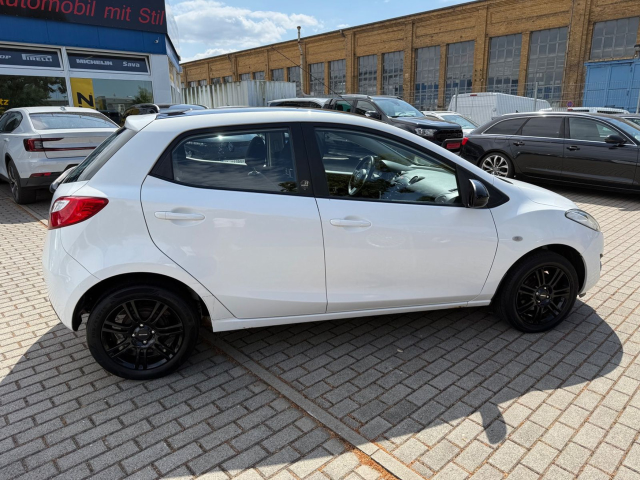 Mazda 2 Lim. 1.3 Origami 5 TÜER KLIMA SHZ TÜV NEU - Autó: 3 kép. Mazda 2 Lim. 1.3 Origami 5 TÜER KLIMA SHZ TÜV NEU - Autó: 3 kép.