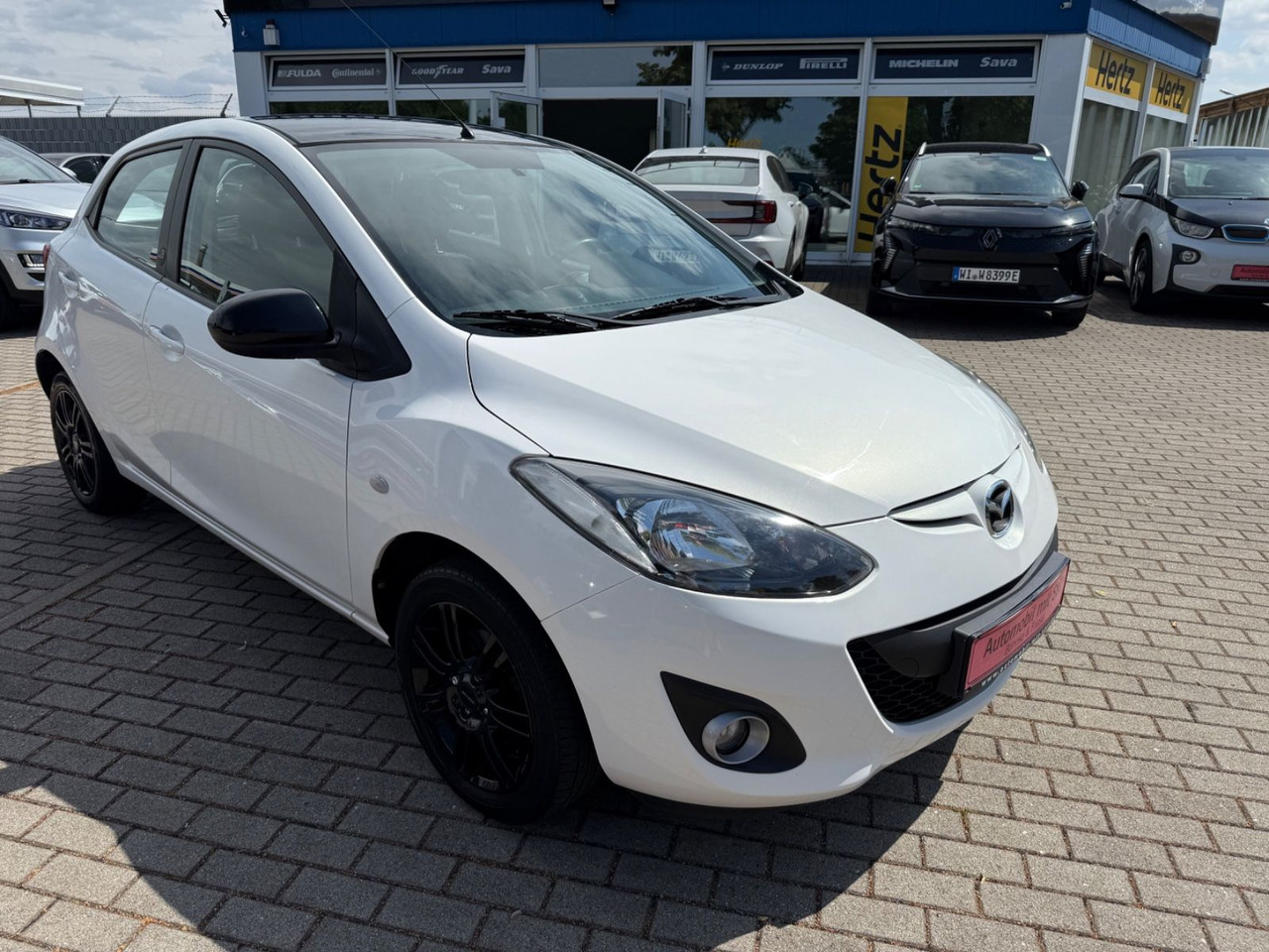 Mazda 2 Lim. 1.3 Origami 5 TÜER KLIMA SHZ TÜV NEU - Autó: 2 kép. Mazda 2 Lim. 1.3 Origami 5 TÜER KLIMA SHZ TÜV NEU - Autó: 2 kép.
