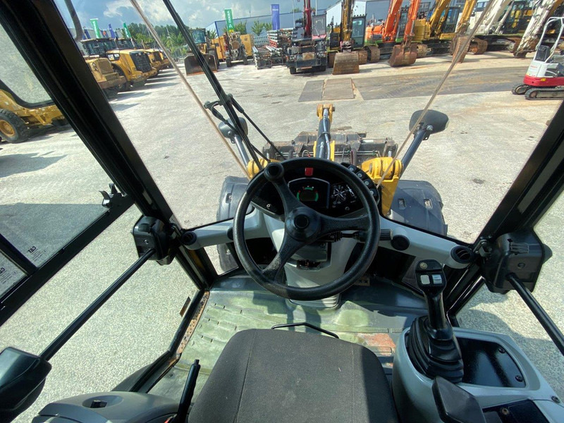 Caterpillar 908 H2 NVT - Gumikerekes homlokrakodó: 4 kép. Caterpillar 908 H2 NVT - Gumikerekes homlokrakodó: 4 kép.