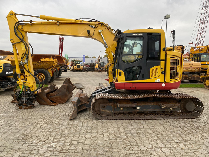 Komatsu PC138US-11 NVT - Lánctalpas kotró: 1 kép. Komatsu PC138US-11 NVT - Lánctalpas kotró: 1 kép.