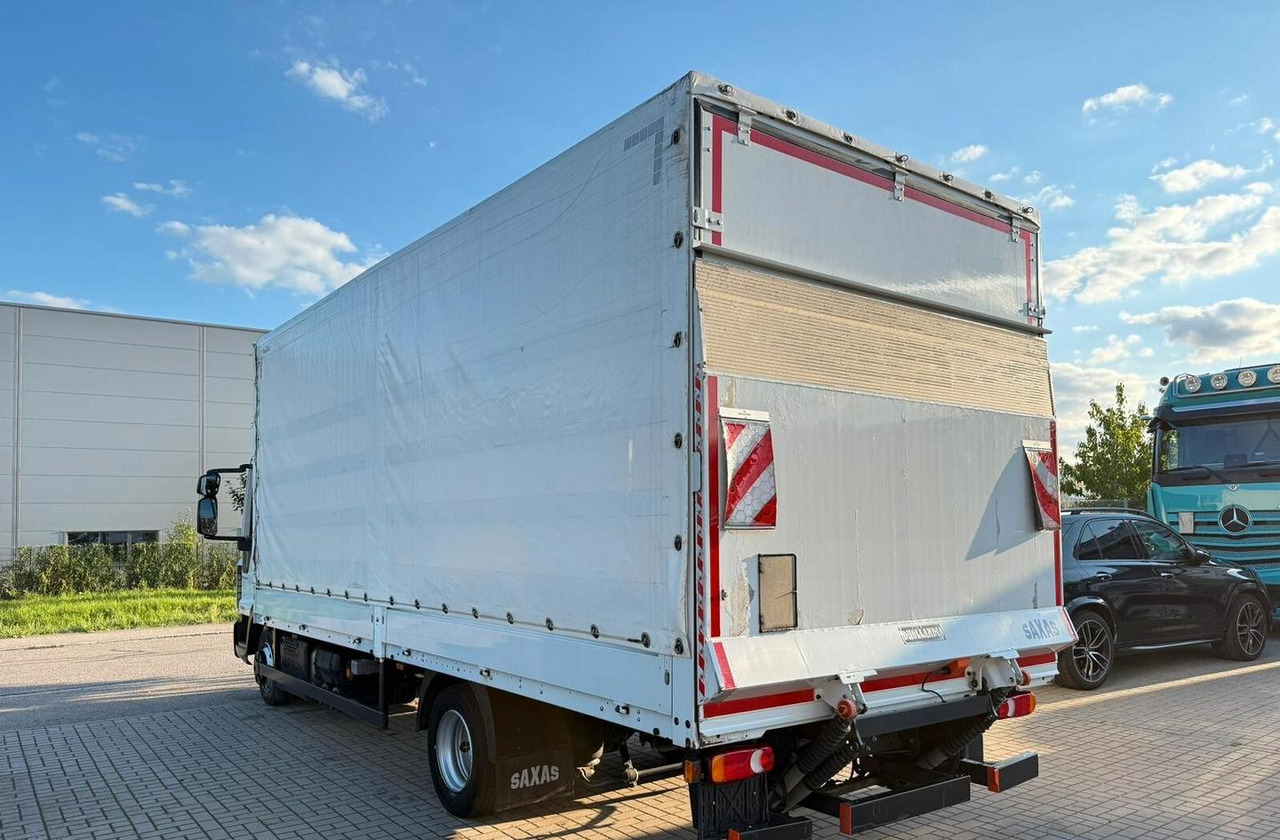 Iveco - Ponyvás teherautó: 4 kép. Iveco - Ponyvás teherautó: 4 kép.
