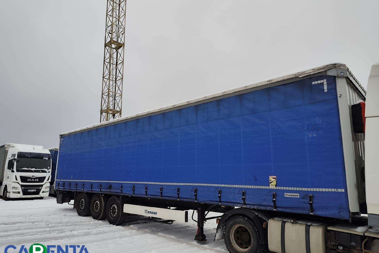 Krone S D - Ponyvás félpótkocsi: 4 kép. Krone S D - Ponyvás félpótkocsi: 4 kép.