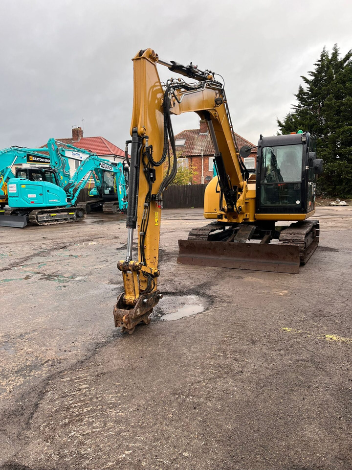 CAT 308E2 - Minikotró: 2 kép. CAT 308E2 - Minikotró: 2 kép.