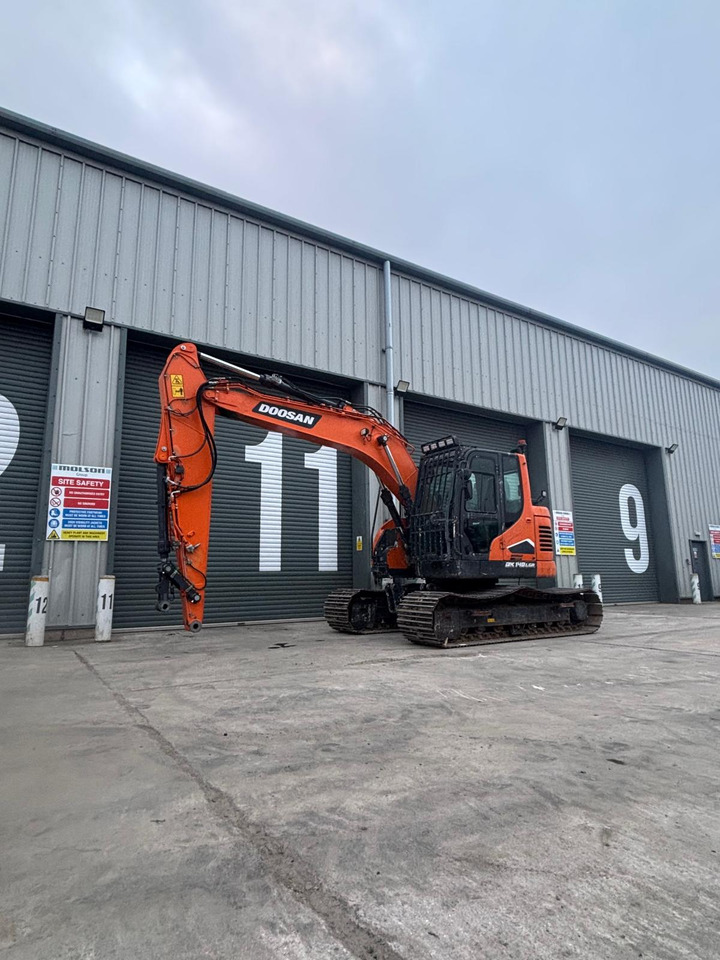 Doosan DX140LCR - Lánctalpas kotró: 1 kép. Doosan DX140LCR - Lánctalpas kotró: 1 kép.