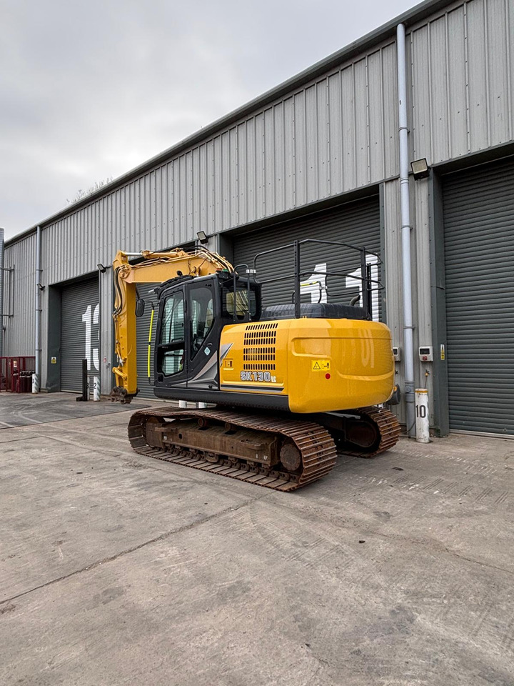 Kobelco SK130LC-11 - Lánctalpas kotró: 3 kép. Kobelco SK130LC-11 - Lánctalpas kotró: 3 kép.