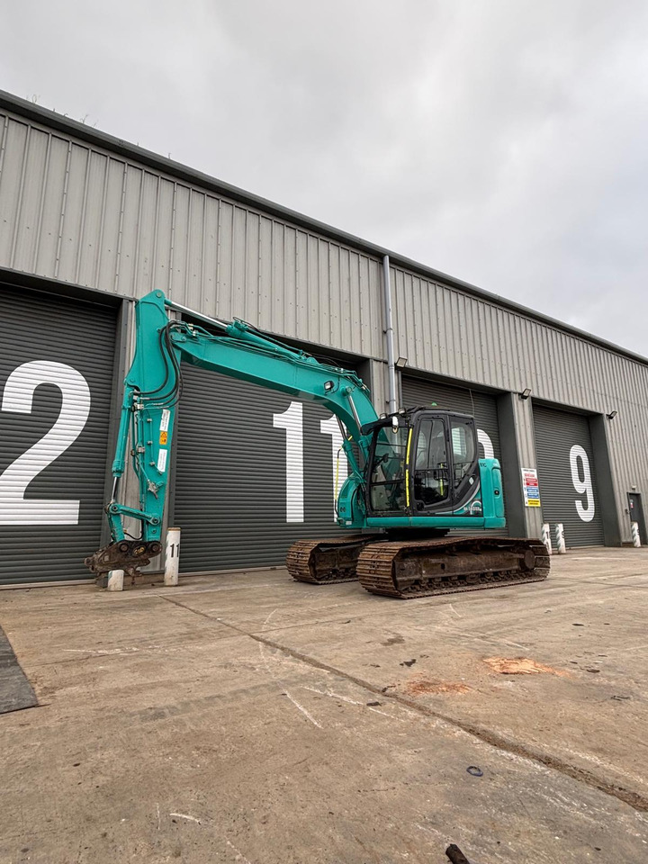 Kobelco SK140SRLC-5 - Lánctalpas kotró: 1 kép. Kobelco SK140SRLC-5 - Lánctalpas kotró: 1 kép.