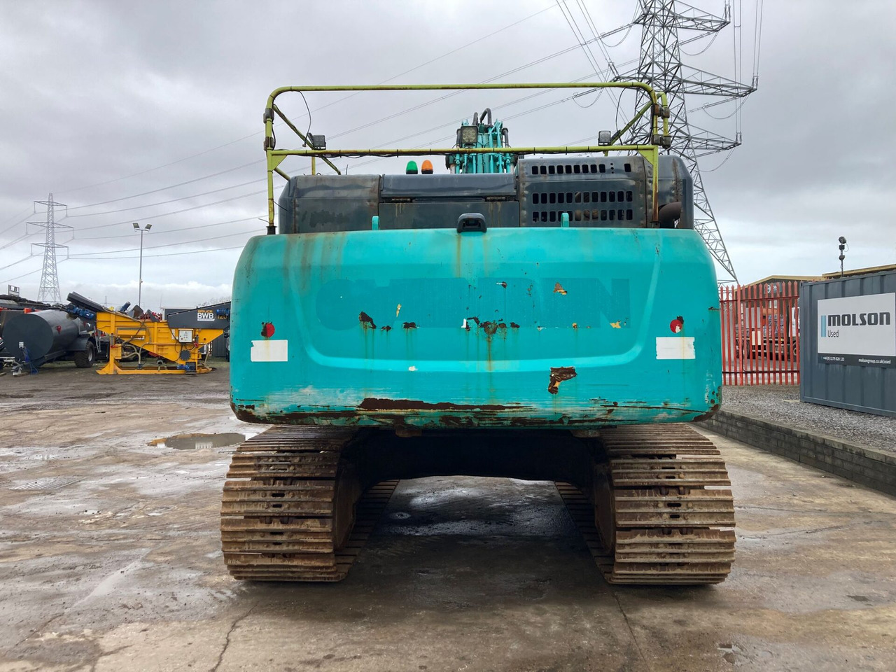 Kobelco SK500LC-10 - Lánctalpas kotró: 4 kép. Kobelco SK500LC-10 - Lánctalpas kotró: 4 kép.