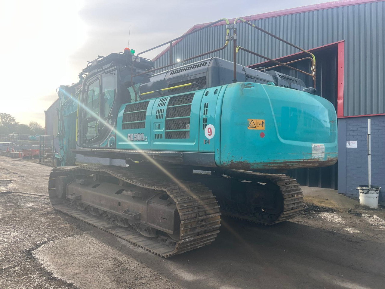 Kobelco SK500LC-10 - Lánctalpas kotró: 3 kép. Kobelco SK500LC-10 - Lánctalpas kotró: 3 kép.