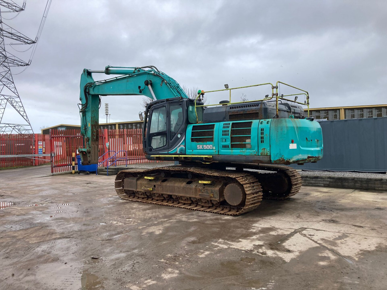 Kobelco SK500LC-10 - Lánctalpas kotró: 3 kép. Kobelco SK500LC-10 - Lánctalpas kotró: 3 kép.