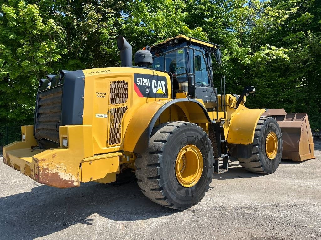 CAT 972 M - Gumikerekes homlokrakodó: 4 kép. CAT 972 M - Gumikerekes homlokrakodó: 4 kép.