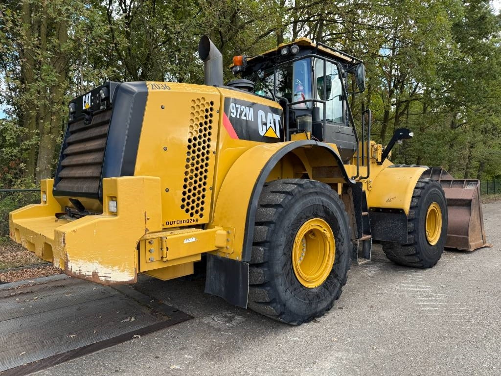 CAT 972 M - Gumikerekes homlokrakodó: 4 kép. CAT 972 M - Gumikerekes homlokrakodó: 4 kép.