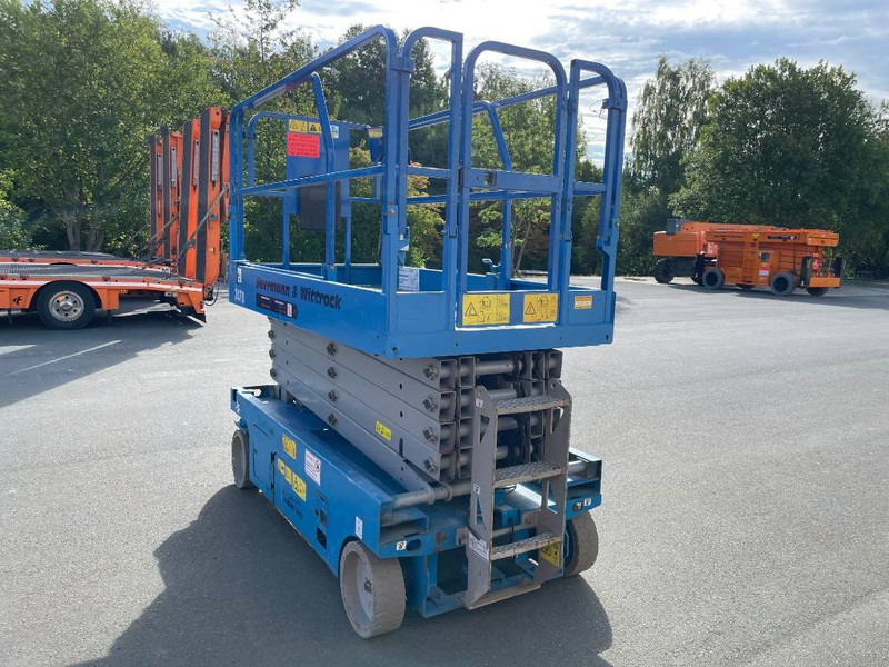 Genie GS 3246 E-Drive - Ollós emelő: 2 kép. Genie GS 3246 E-Drive - Ollós emelő: 2 kép.