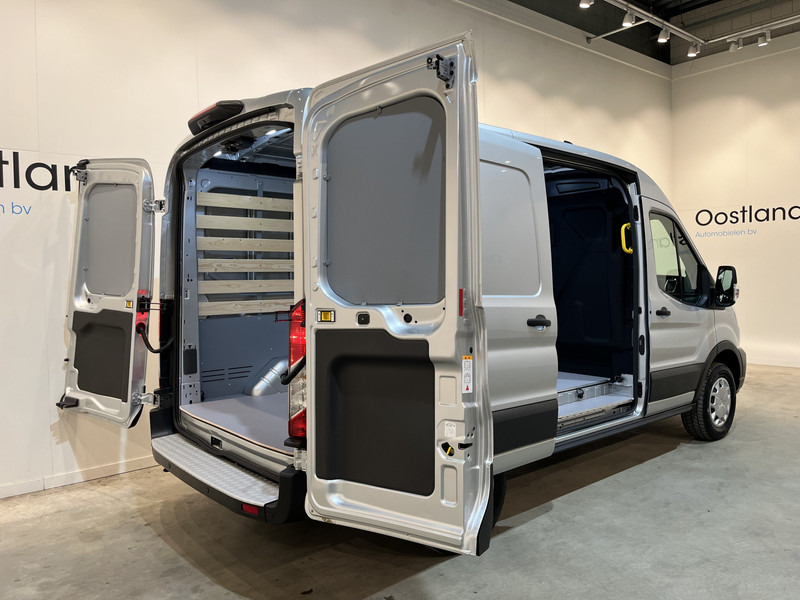 Ford E-Transit 350 L2H2 Trend 68 kWh 184 PK / 100% elektrisch !! / Airco / Cruise Control / CarPlay / Camera / Navigatie / 3-Zits / 900 KM !! Z.G.A.N. ! - Furgon, Elektromos kisteherautó: 4 kép. Ford E-Transit 350 L2H2 Trend 68 kWh 184 PK / 100% elektrisch !! / Airco / Cruise Control / CarPlay / Camera / Navigatie / 3-Zits / 900 KM !! Z.G.A.N. ! - Furgon, Elektromos kisteherautó: 4 kép.