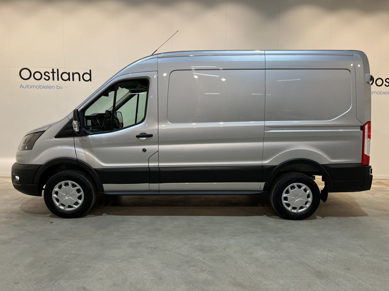 Ford E-Transit 350 L2H2 Trend 68 kWh 184 PK / 100% elektrisch !! / Airco / Cruise Control / CarPlay / Camera / Navigatie / 3-Zits / 900 KM !! Z.G.A.N. ! - Furgon, Elektromos kisteherautó: 2 kép. Ford E-Transit 350 L2H2 Trend 68 kWh 184 PK / 100% elektrisch !! / Airco / Cruise Control / CarPlay / Camera / Navigatie / 3-Zits / 900 KM !! Z.G.A.N. ! - Furgon, Elektromos kisteherautó: 2 kép.