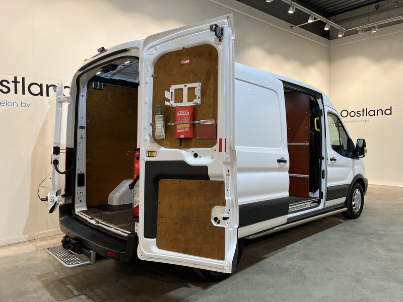 Ford Transit 350 2.0 TDCI L3H2 Trend 130 PK / Euro 6 / 220V / Airco / Cruise Control / Trekhaak / Camera - Furgon: 2 kép. Ford Transit 350 2.0 TDCI L3H2 Trend 130 PK / Euro 6 / 220V / Airco / Cruise Control / Trekhaak / Camera - Furgon: 2 kép.