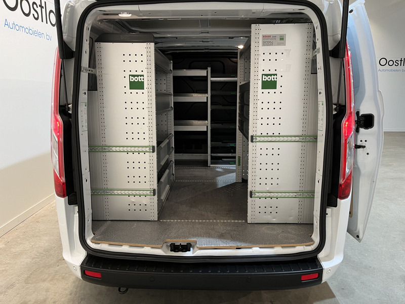 Ford Transit Custom 300 2.0 TDCI L1H1 Trend 130 PK / Servicebus / Bott Inrichting / Euro 6 / Schuifdeur L + R / Airco / CarPlay / Klep / PDC / Navigatie / 3-Zits / BPM VRIJ !! - Kis furgon: 4 kép. Ford Transit Custom 300 2.0 TDCI L1H1 Trend 130 PK / Servicebus / Bott Inrichting / Euro 6 / Schuifdeur L + R / Airco / CarPlay / Klep / PDC / Navigatie / 3-Zits / BPM VRIJ !! - Kis furgon: 4 kép.
