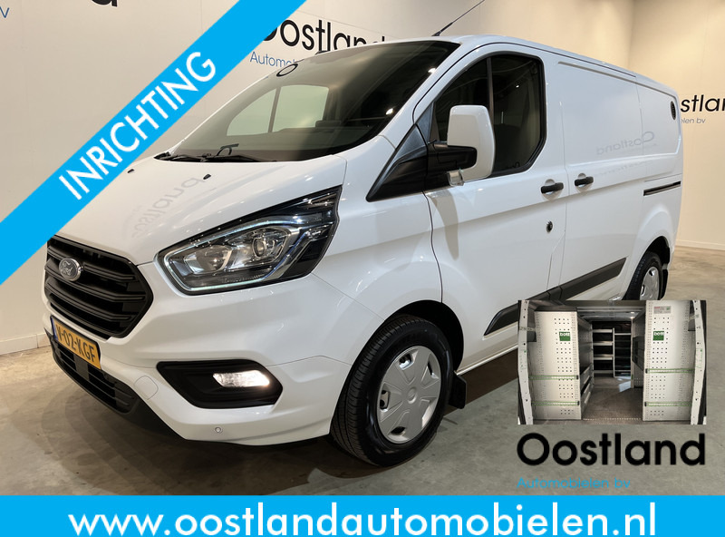 Ford Transit Custom 300 2.0 TDCI L1H1 Trend 130 PK / Servicebus / Bott Inrichting / Euro 6 / Schuifdeur L + R / Airco / CarPlay / Klep / PDC / Navigatie / 3-Zits / BPM VRIJ !! - Kis furgon: 1 kép. Ford Transit Custom 300 2.0 TDCI L1H1 Trend 130 PK / Servicebus / Bott Inrichting / Euro 6 / Schuifdeur L + R / Airco / CarPlay / Klep / PDC / Navigatie / 3-Zits / BPM VRIJ !! - Kis furgon: 1 kép.