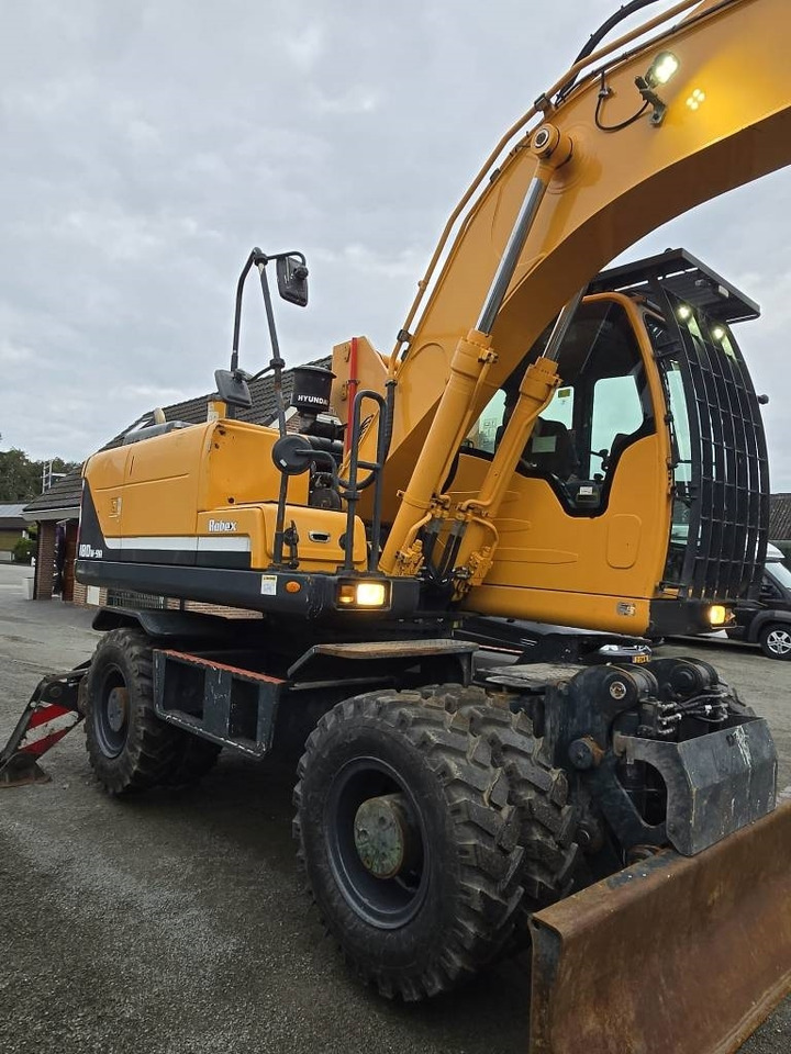 Hyundai R 180W-9A - Gumikerekes kotró: 5 kép. Hyundai R 180W-9A - Gumikerekes kotró: 5 kép.