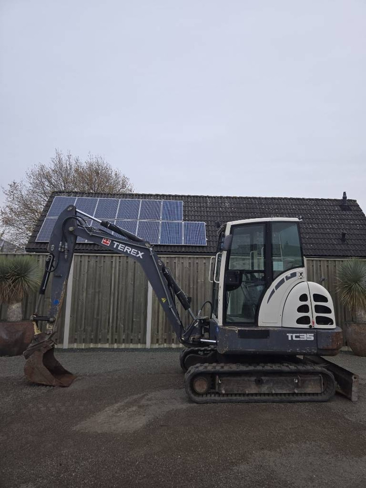 Terex TC 35 - Minikotró: 1 kép. Terex TC 35 - Minikotró: 1 kép.