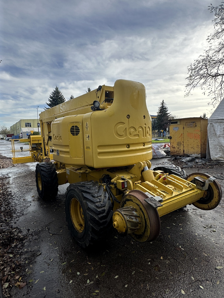 GENIE REXQUOTE Accessrailer Z60/34 railroad boom lift cherry picker mewp - Személyemelő: 3 kép. GENIE REXQUOTE Accessrailer Z60/34 railroad boom lift cherry picker mewp - Személyemelő: 3 kép.